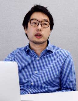 岡田憲明氏