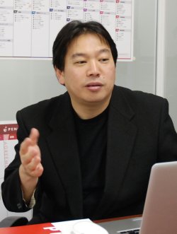 覚田義明氏